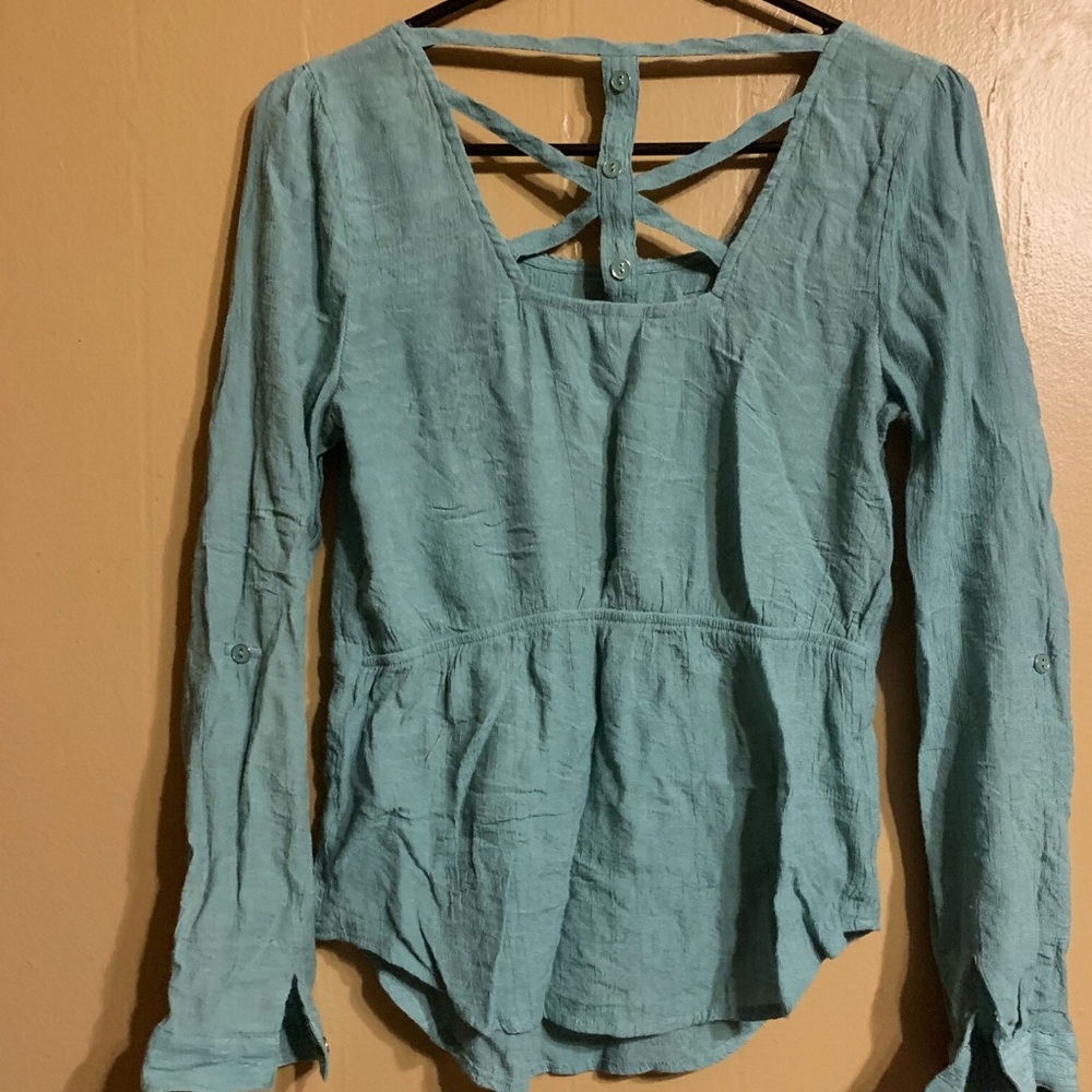 Turquoise colored blouse